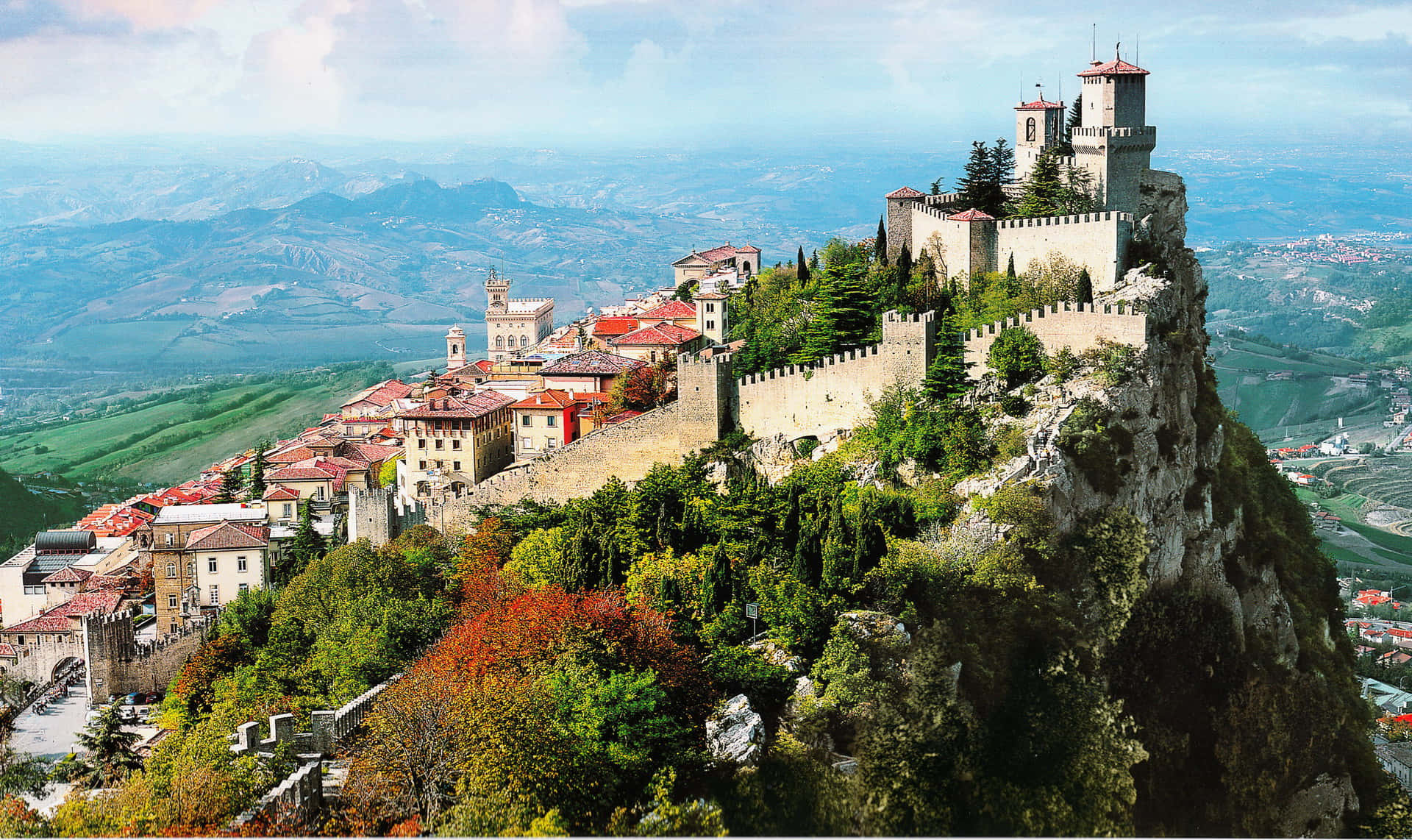 Scenic View Of The Historic Guaita Tower And Surrounding Establishments Background