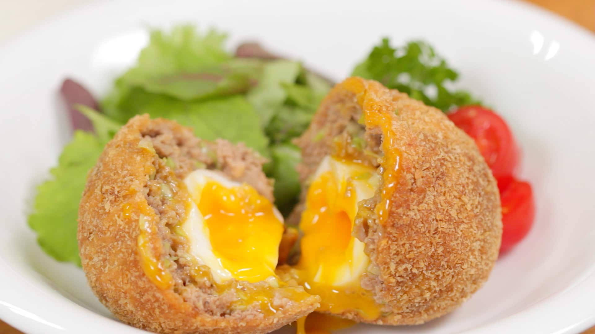 Scotch Egg Runny Yolk And Vegetable Salad Background