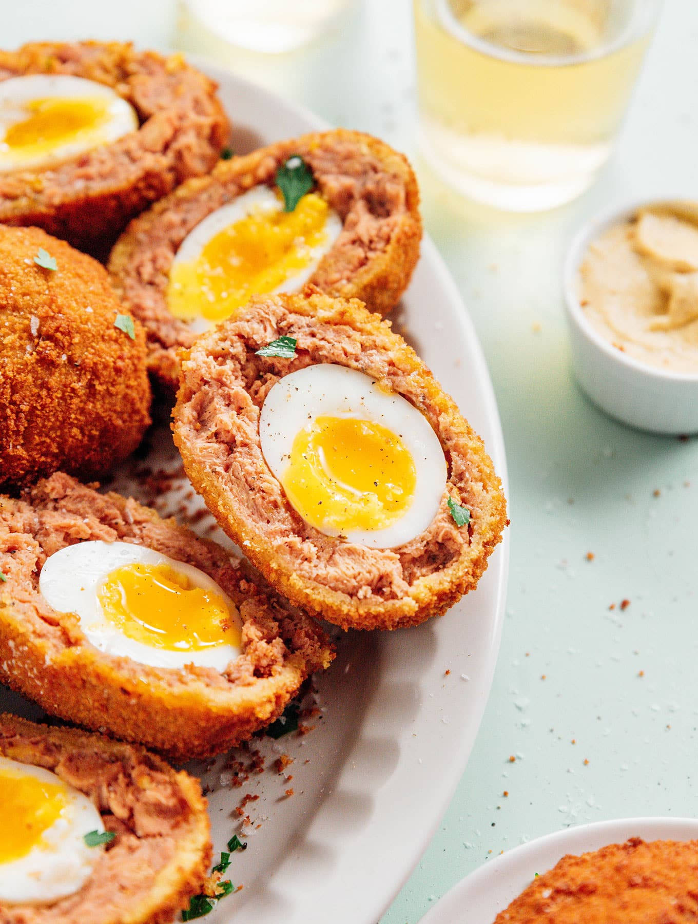 Scotch Eggs Creamy Sauce And Garnish