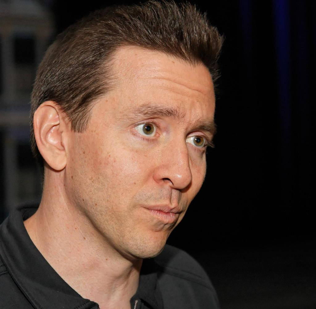 Scott Forstall Wide-eyed Close Up Background