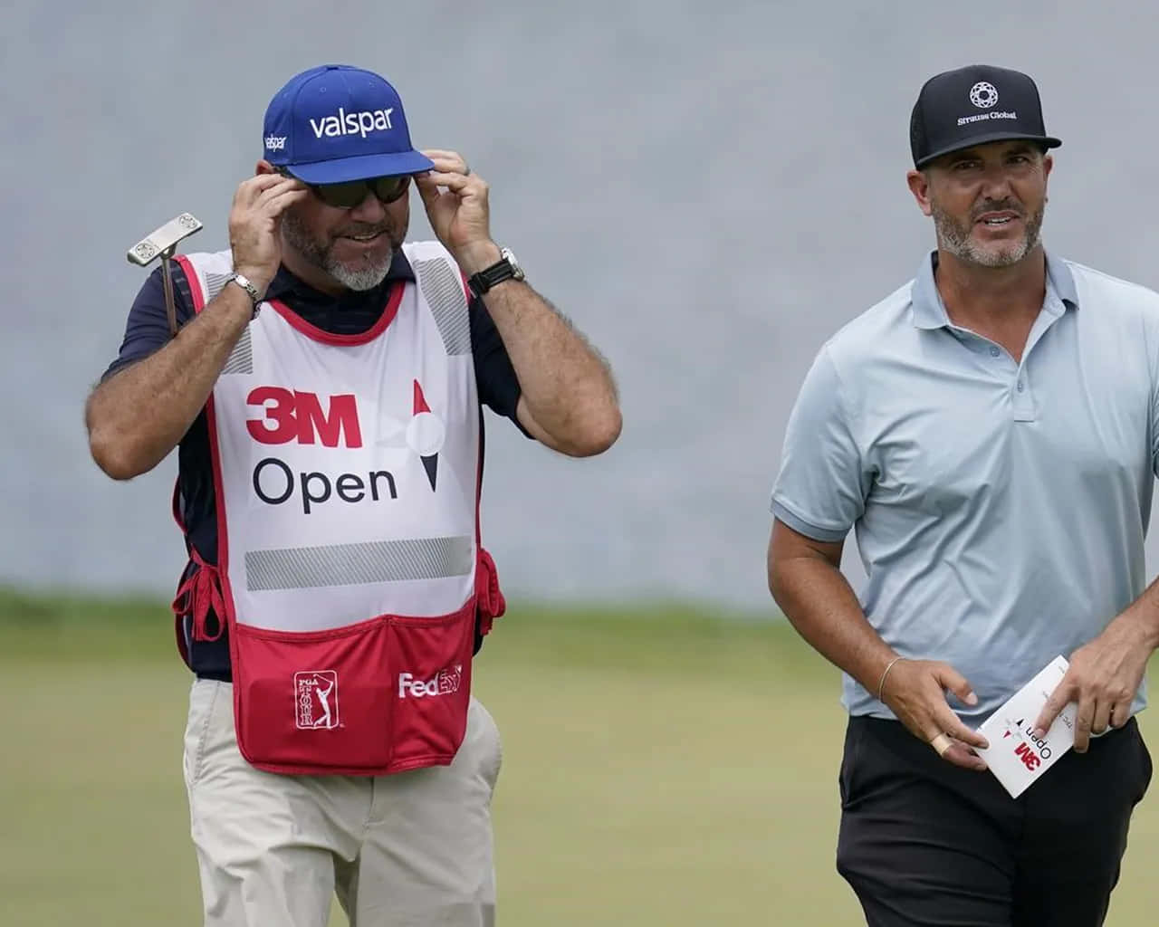 Scott Piercy With His Caddie Background