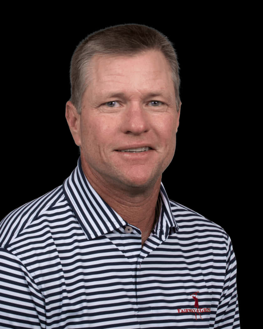 Scott Verplank Taking A Powerful Swing During A Golf Tournament Background