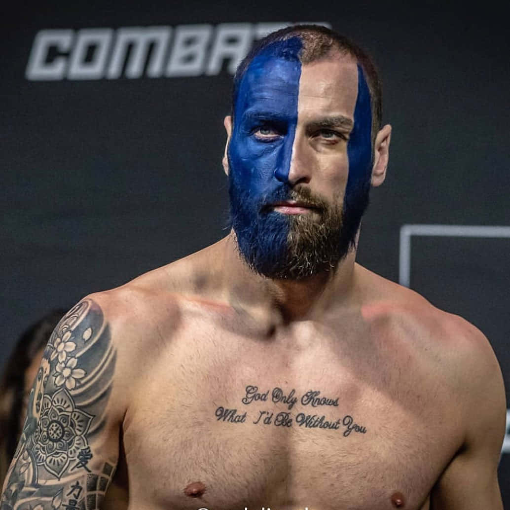 Scottish Fighter Paul Craig Wearing Woad Paint Background
