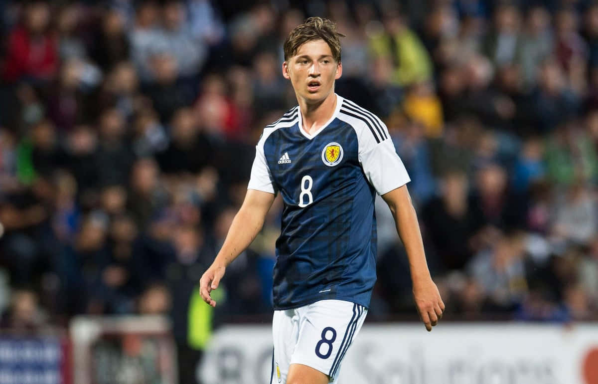 Scottish Midfielder Ryan Gauld Action Shot Background
