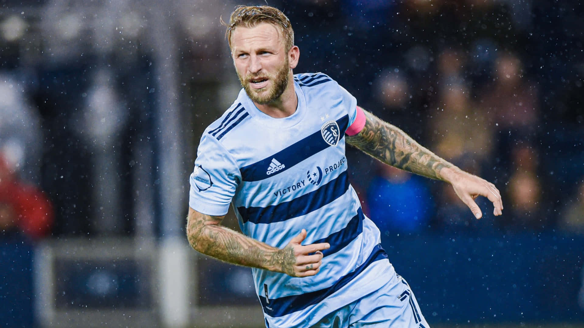 Scottish Professional Football Player Johnny Russell Rain Background