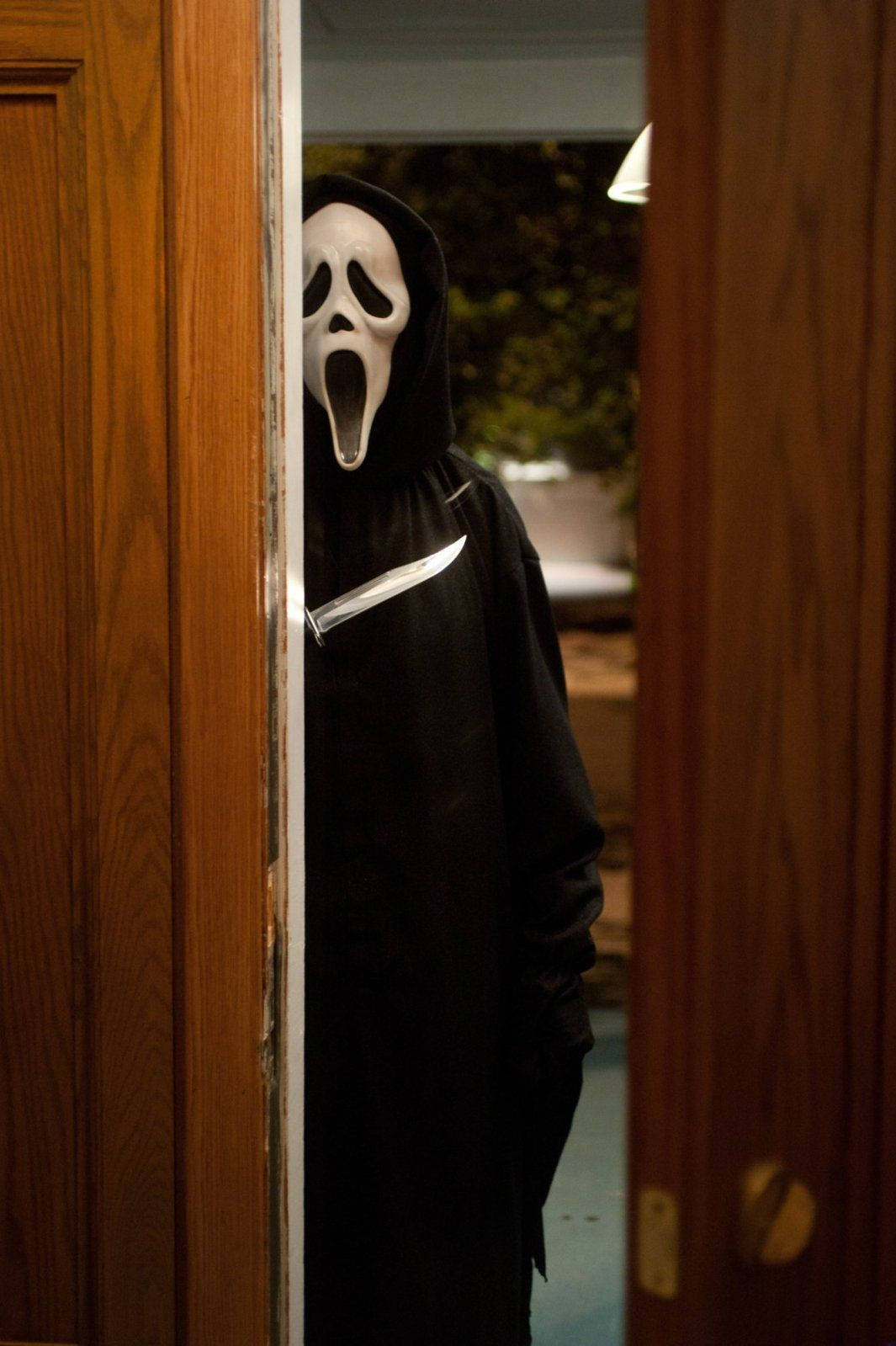 Scream Ghostface Behind Door Background