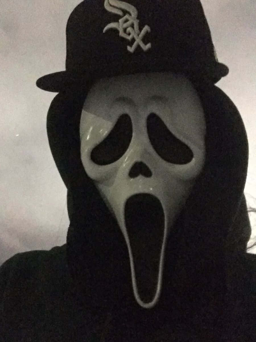 Scream Ghostface Wearing A Sox Baseball Cap Background