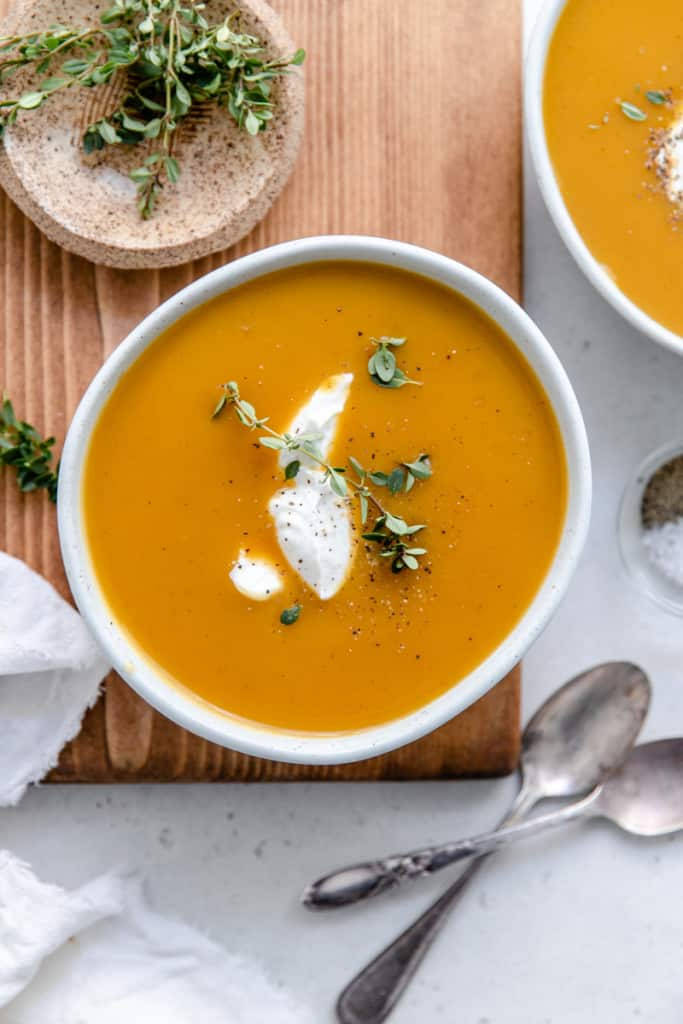 Scrummy Pumpkin Soup With Cream Background