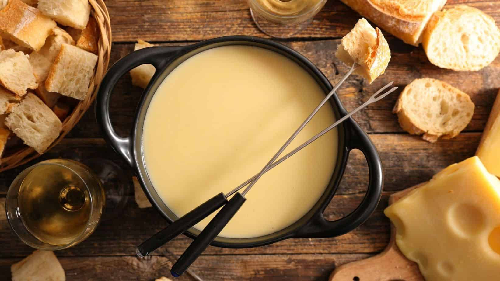 Scrumptious Classic Cheese Fondue Background