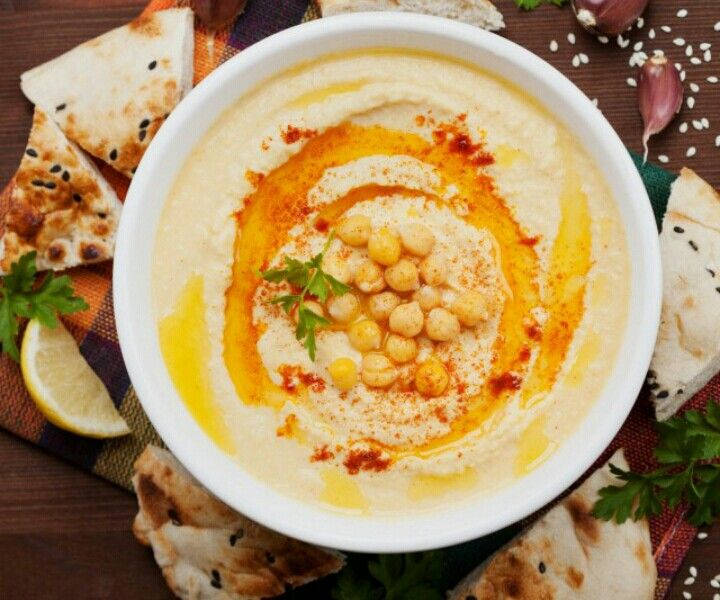 Scrumptious Hummus Spread With Olive Oil Background