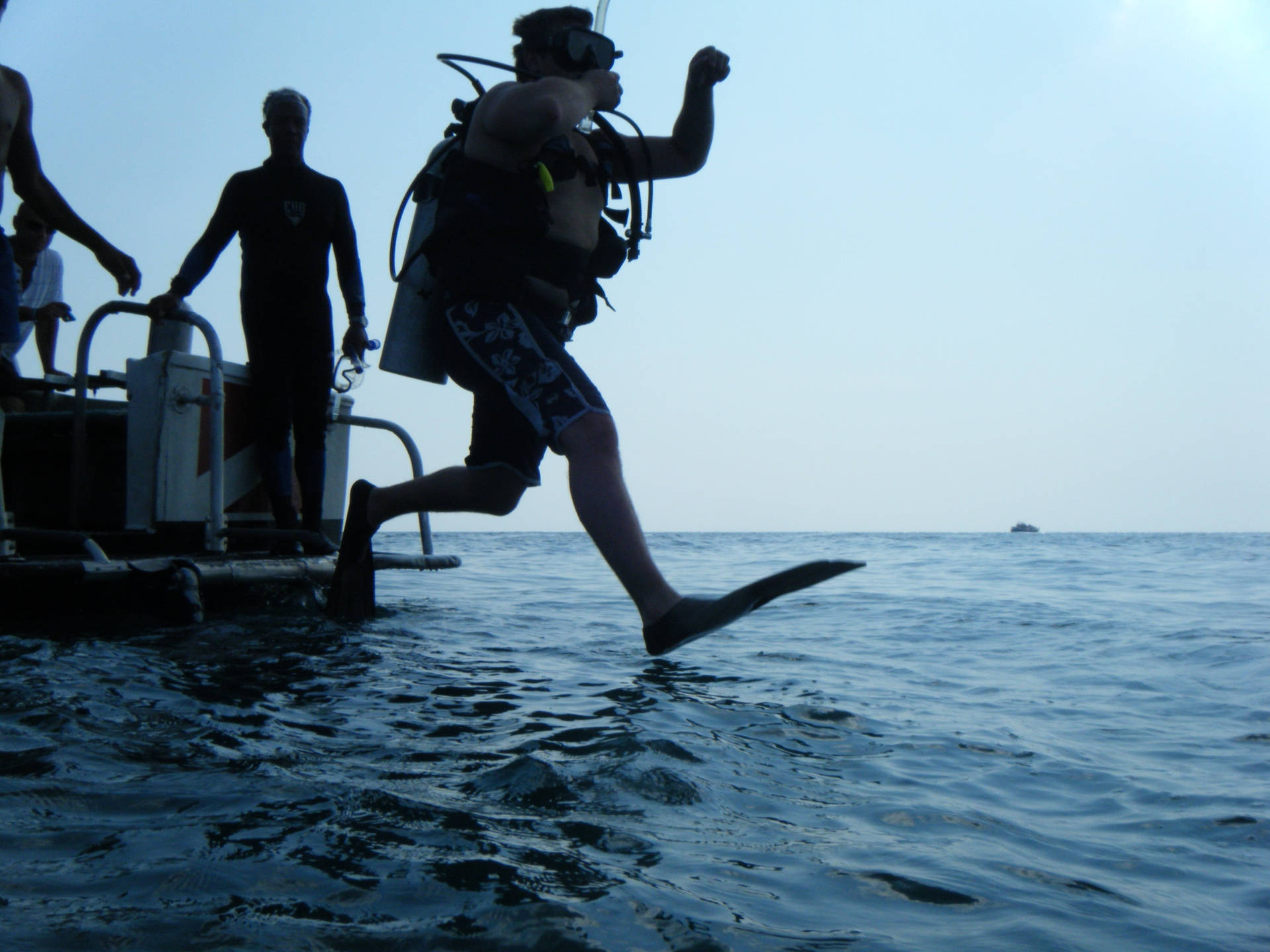Scuba Diving Jumping Into Sea Background