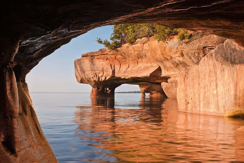 Sea Cave Sunset Reflection