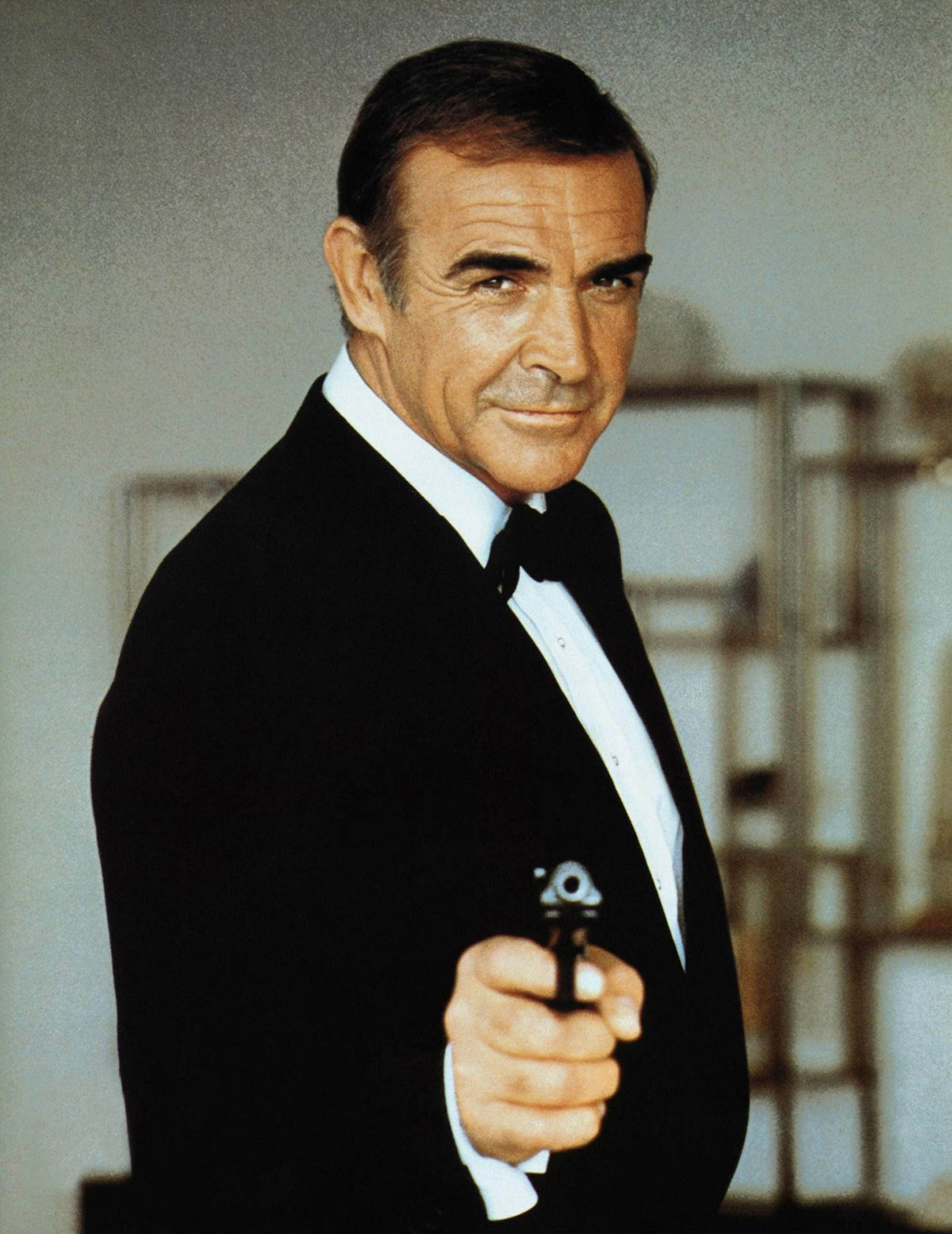Sean Connery 1983 Gun Pose Background