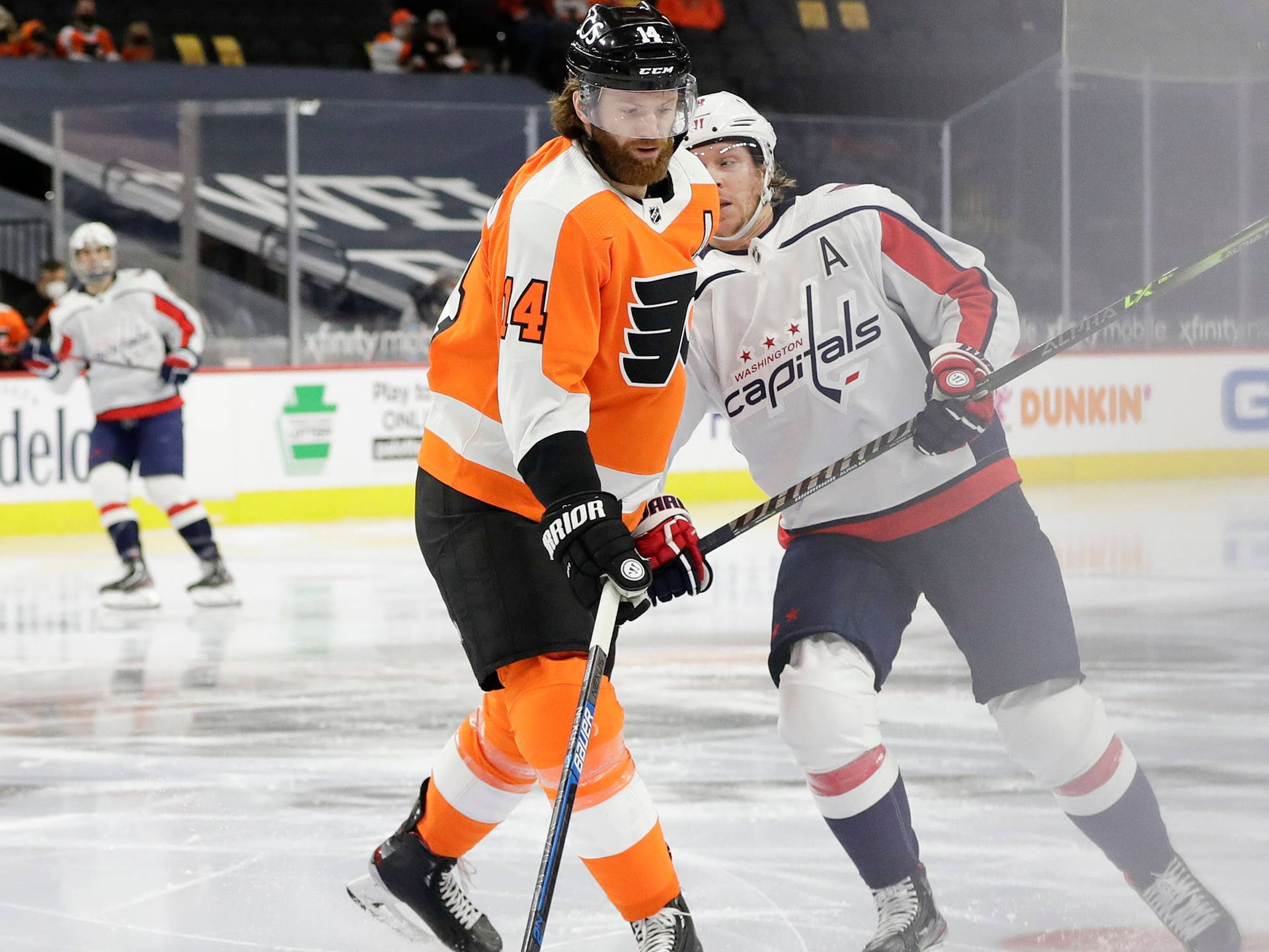 Sean Couturier Against An Opponent Background