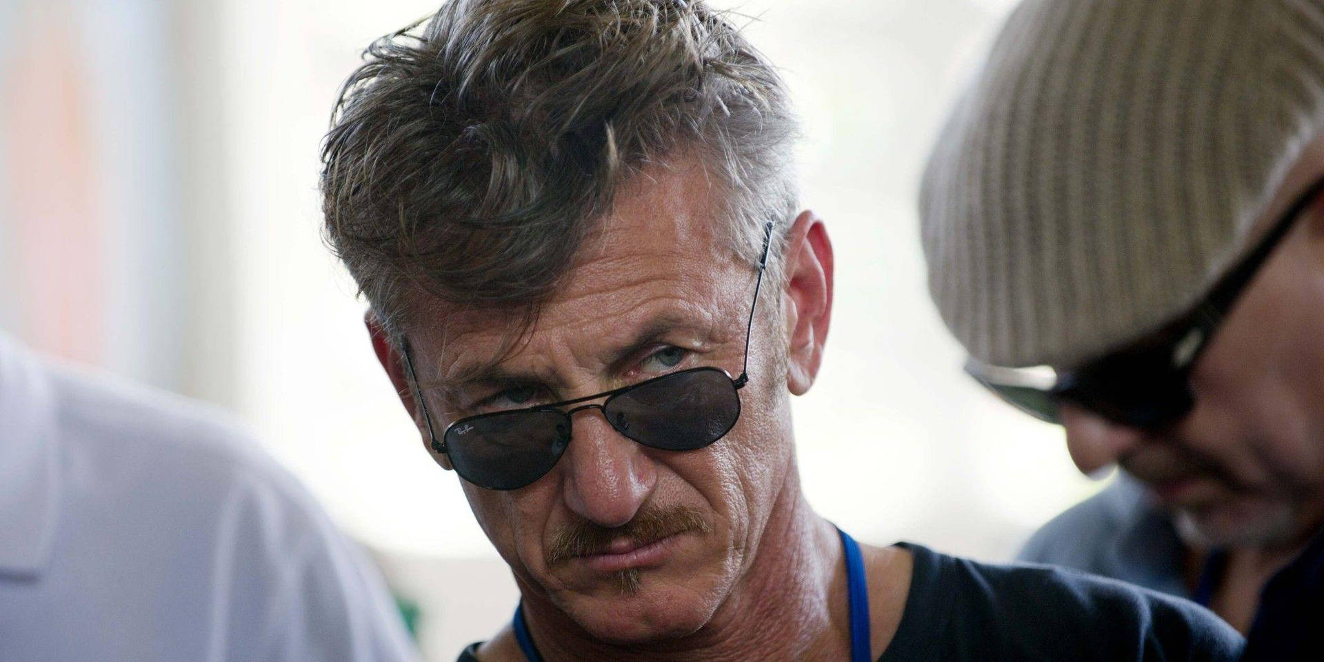 Sean Penn Wearing Shades Background