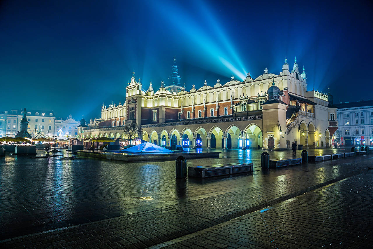 Searchlights Behind Krakow Cloth Hall Background