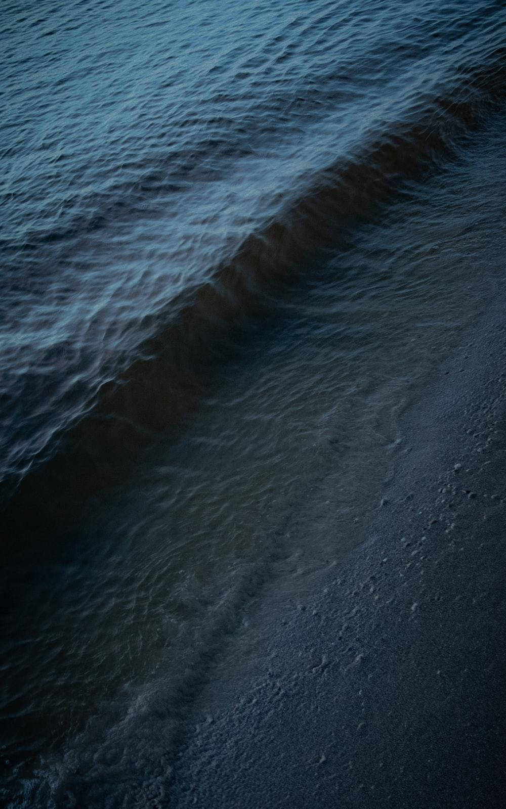 Seashore Calm Waves Dark Mode Background