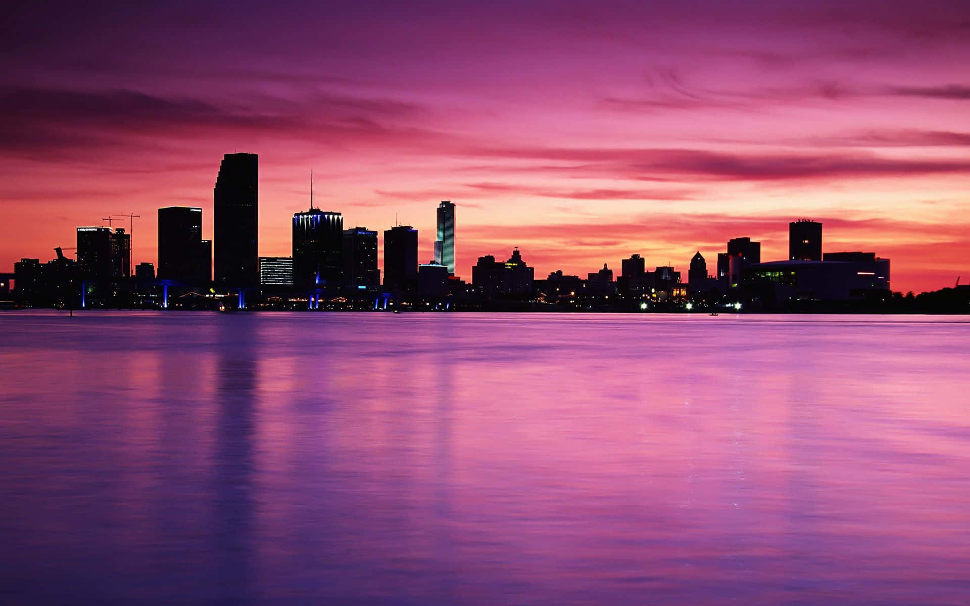 Seaside Pink City Skyline Background