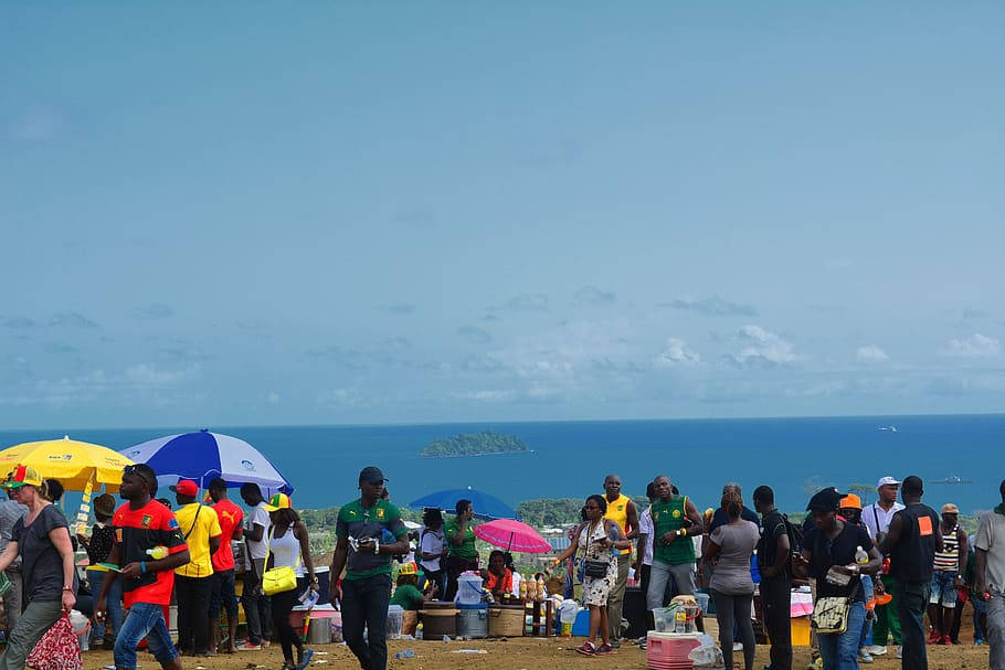 Seaside With Crowded People Cameroon Background