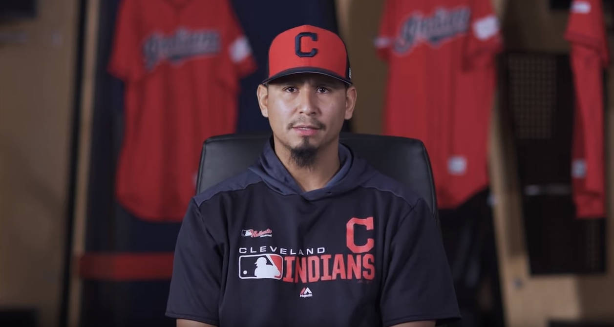 Seated Black Jersey Carlos Carrasco Background