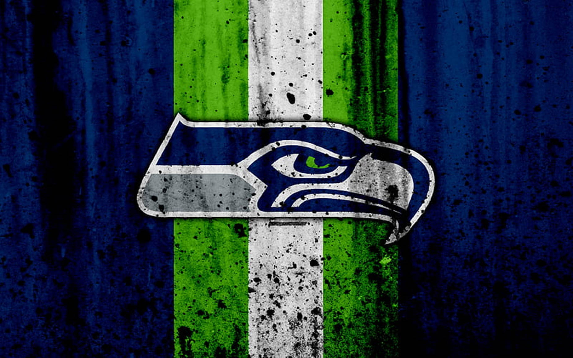 Seattle Seahawks Logo With Black Paint Splatters Background