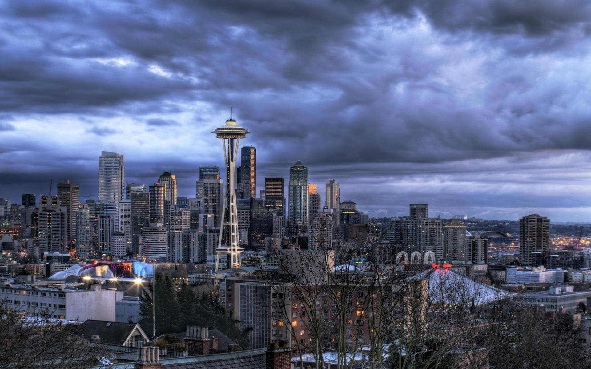 Seattle Skyline And Dark Clouds Background