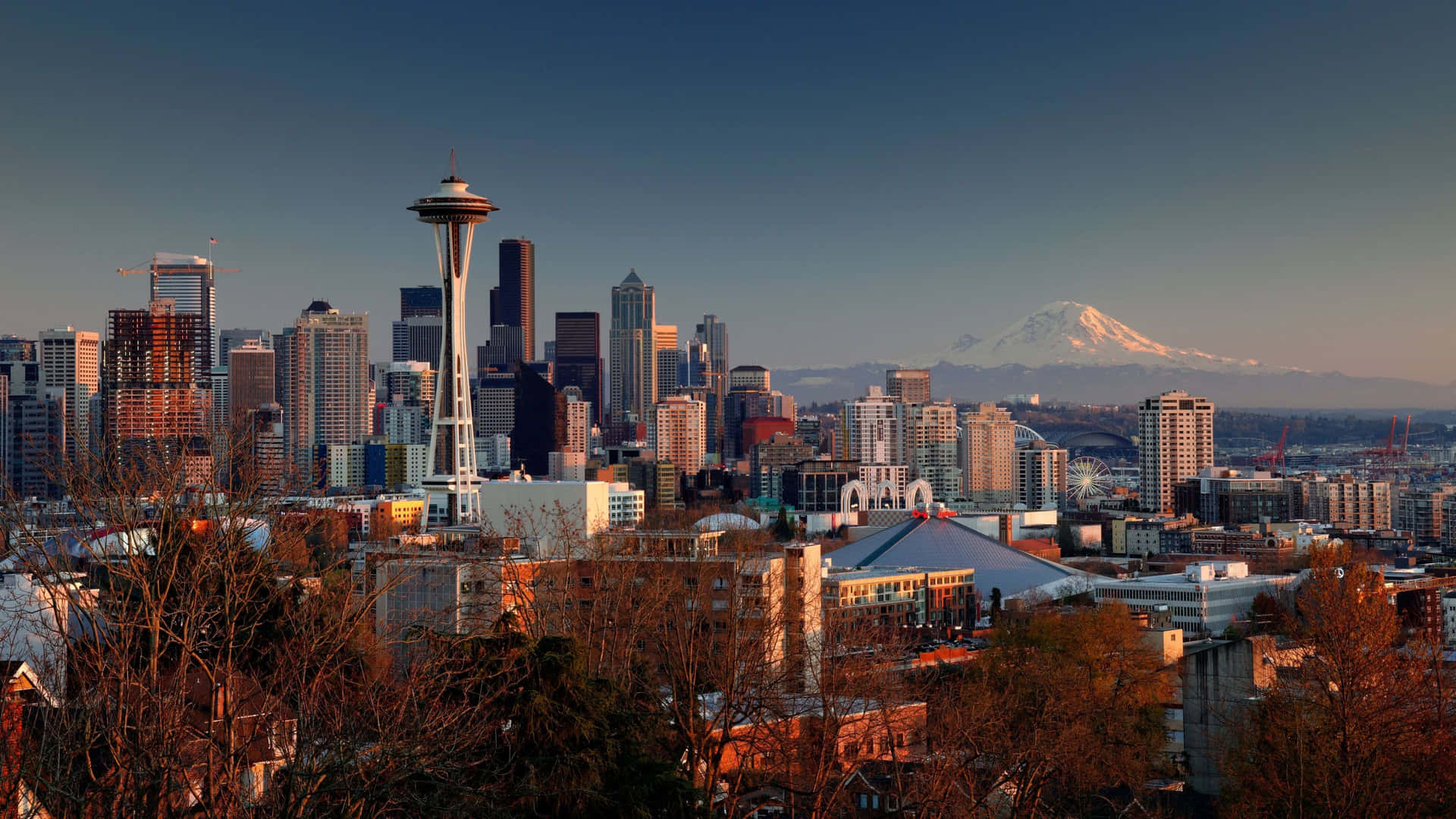 Seattle Skyline At Sunset With Mt Mccall In The Background Background