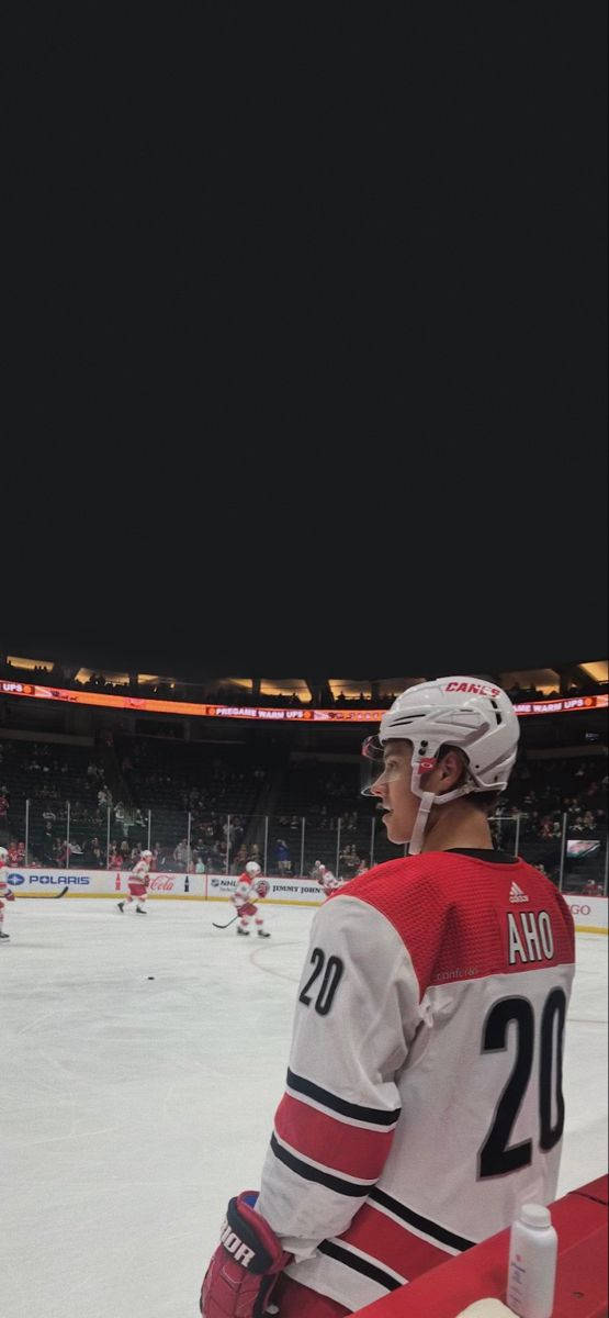 Sebastian Aho In Action On The Ice Background