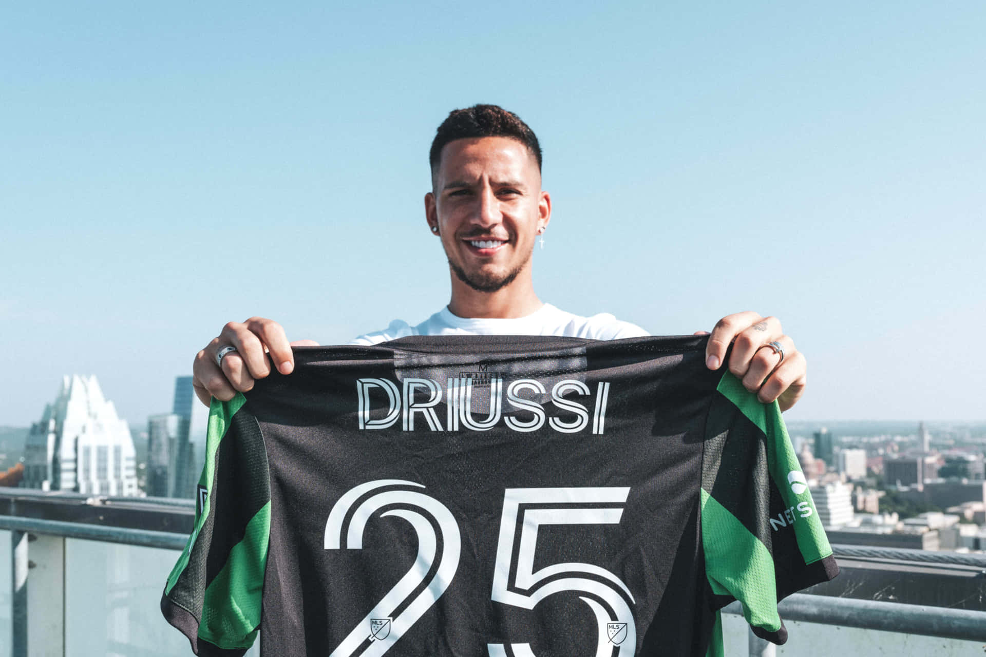 Sebastian Driussi Proud With Yeti Jersey Number 25 Background
