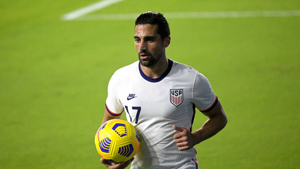 Sebastian Lleget Holding Soccer Ball Background