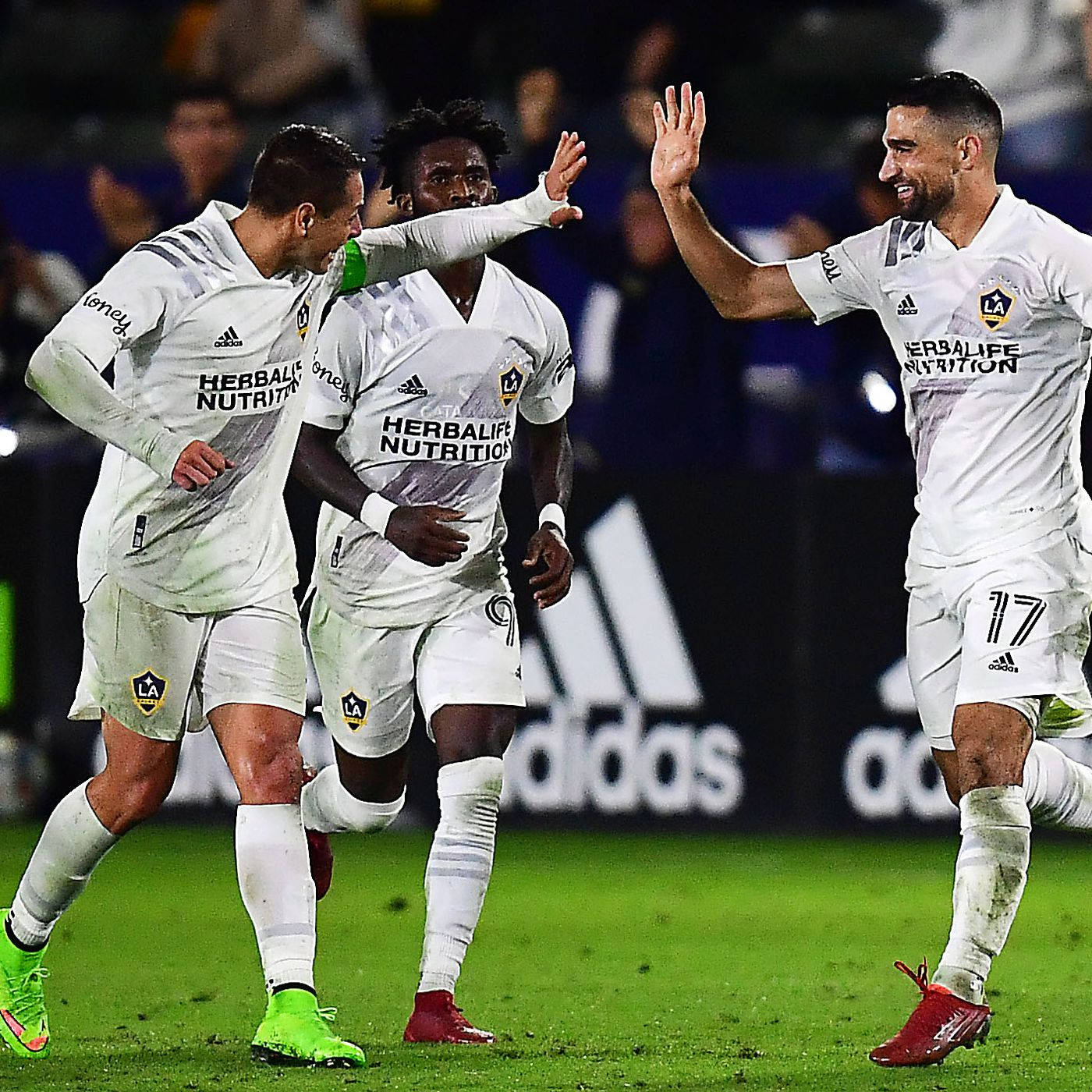 Sebastian Lletget High Fives Teammate