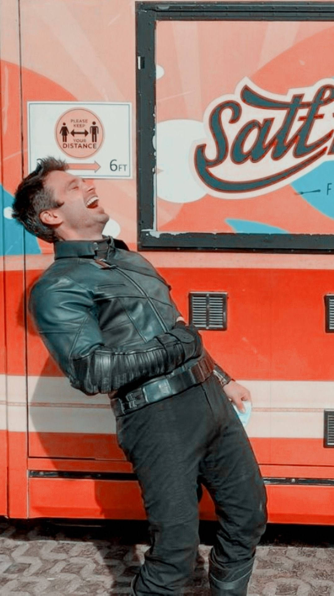 Sebastian Stan Laughing Background