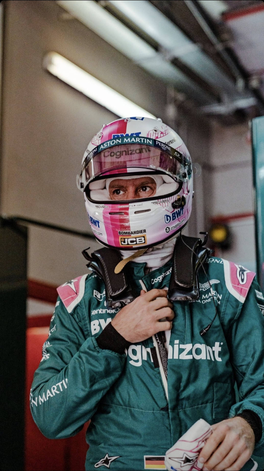 Sebastian Vettel Donned In A Sharp Green Racing Suit Background