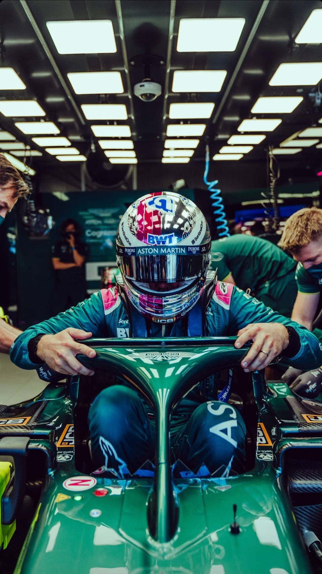 Sebastian Vettel Leaning Forward In Car Background