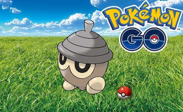 Seedot Standing On The Grass Field Background