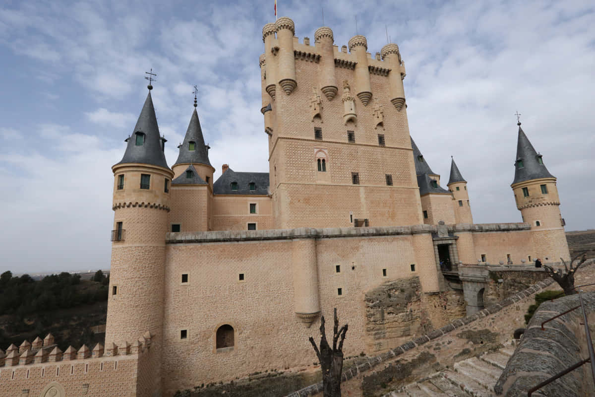 Segovia Castle Against Gloomy Sky Background