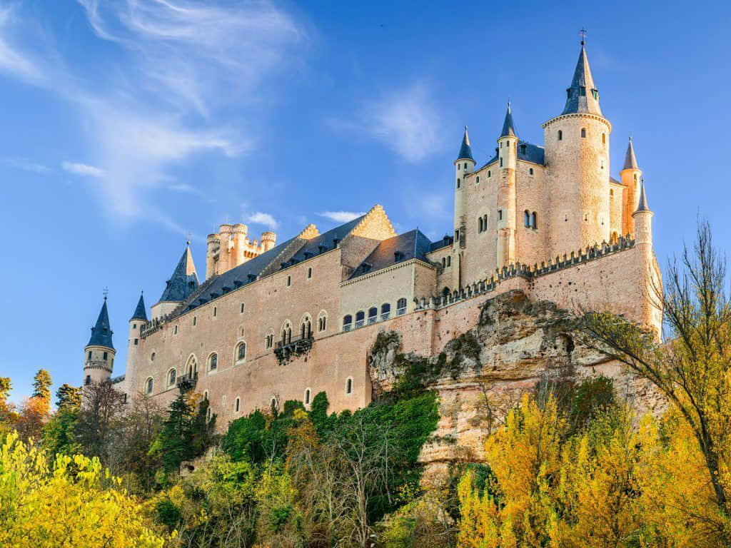 Segovia Castle Sitting On Rock Background