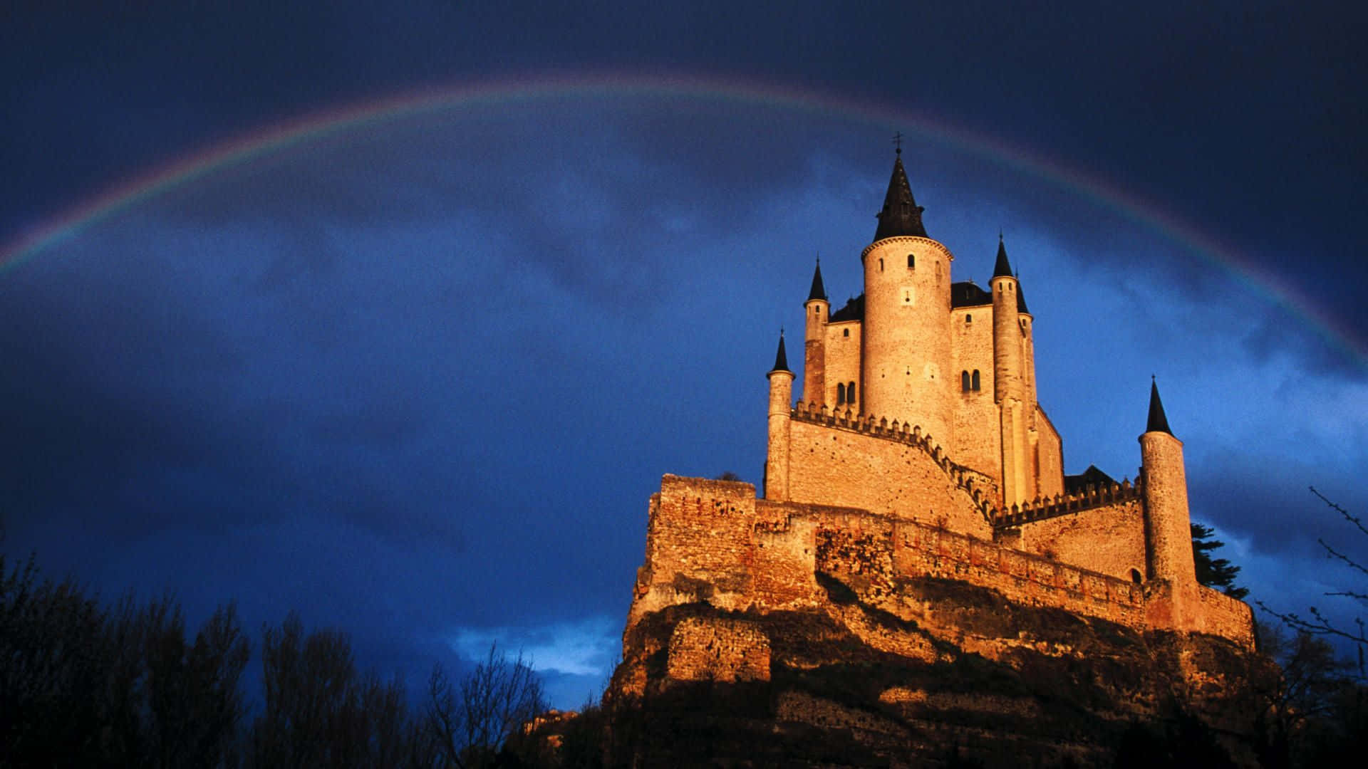Segovia Castle With Rainbow Background