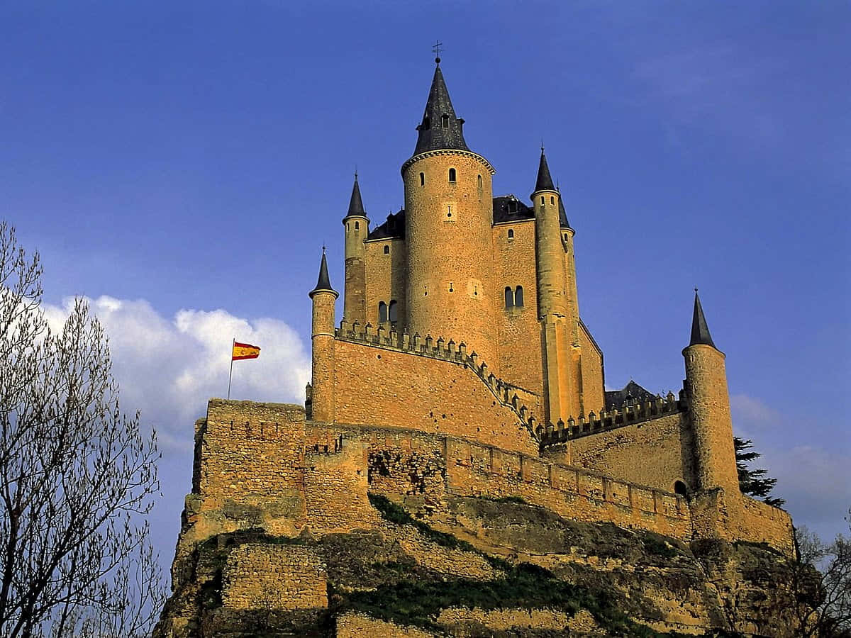 Segovia Castle With Spain Flag Background