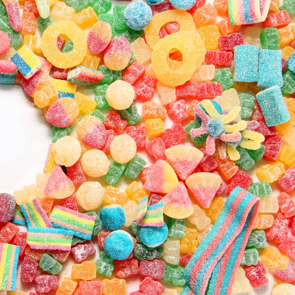 Selection Of Delicious Sour Candies Background