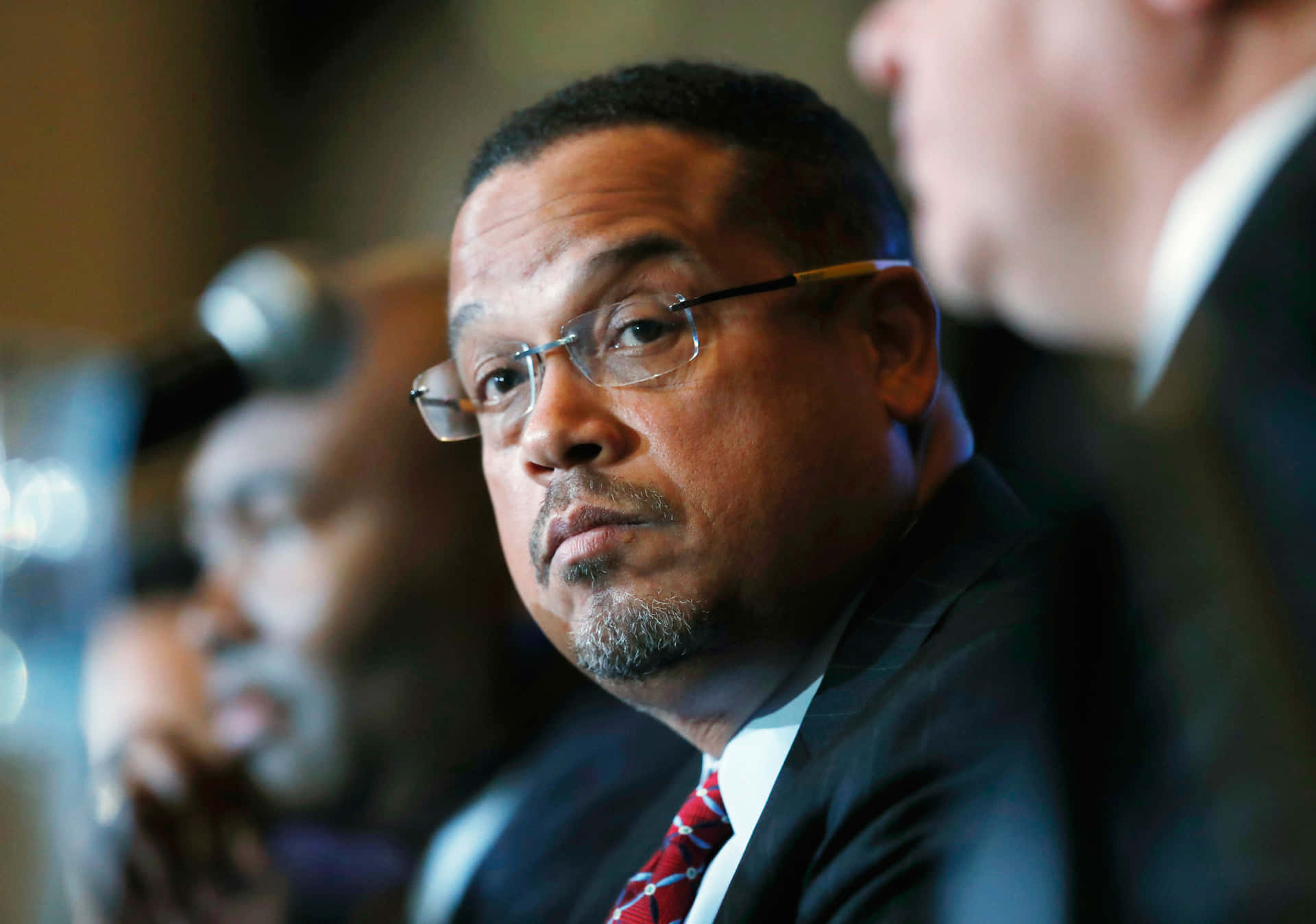 Selective Focus Image Of Keith Ellison Background
