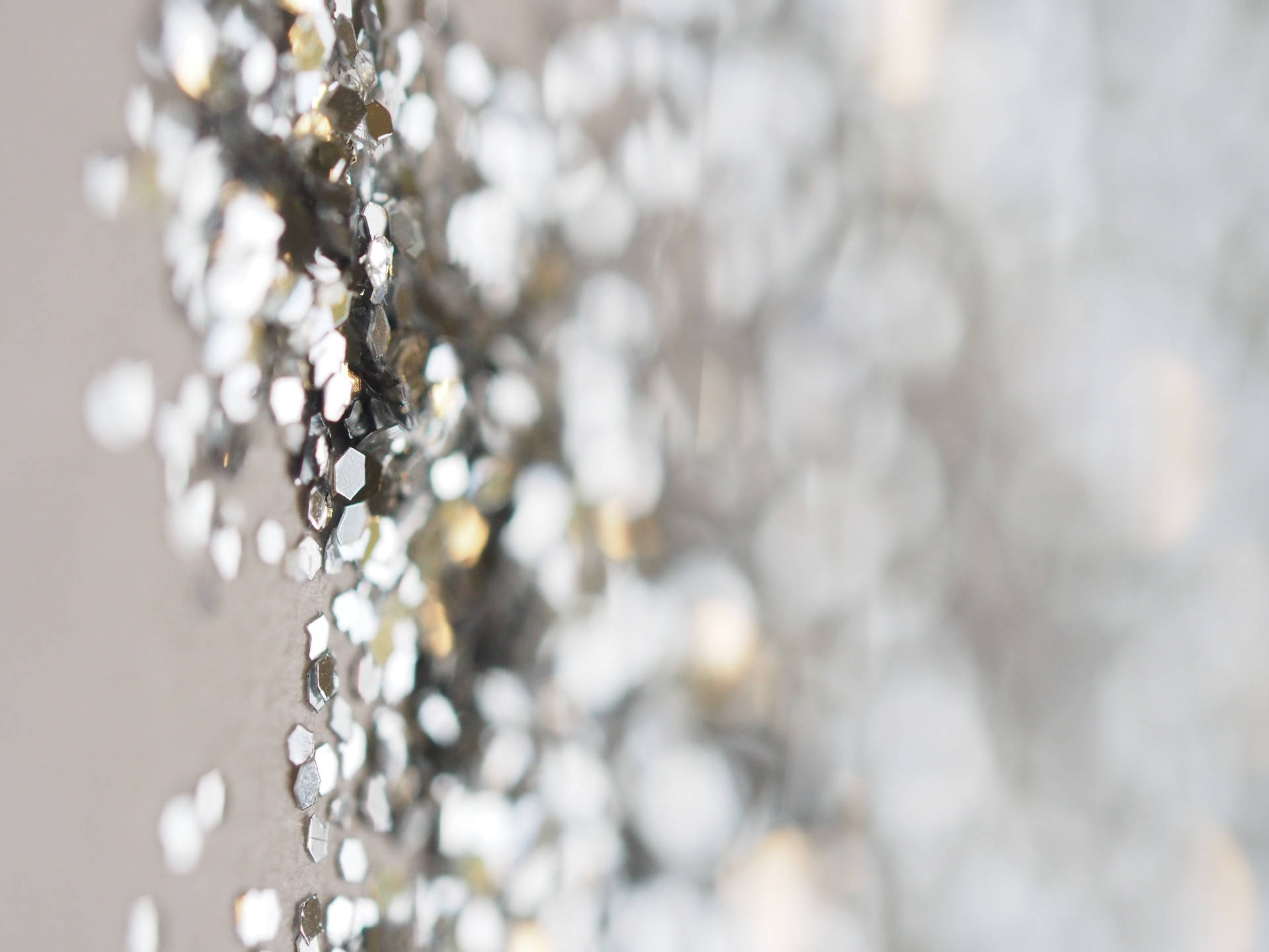 Selective Focus Shiny Silver Glitter Texture Background