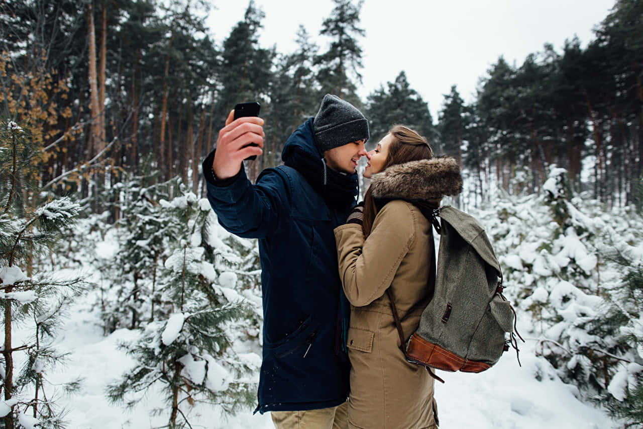 Selfie Man And Woman Couple During Winter