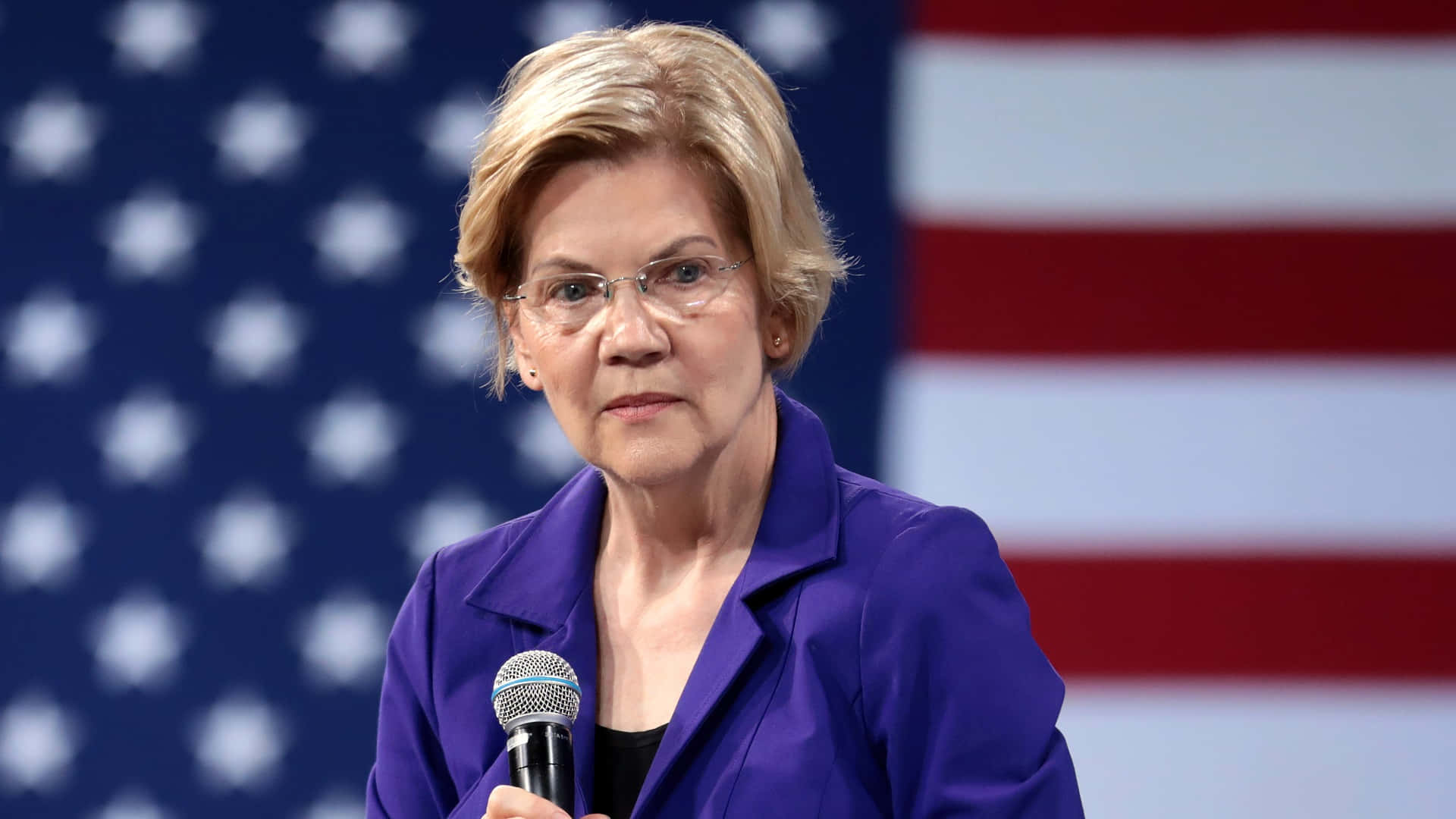 Senator Elizabeth Warren Dazzles In Violet Coat Background