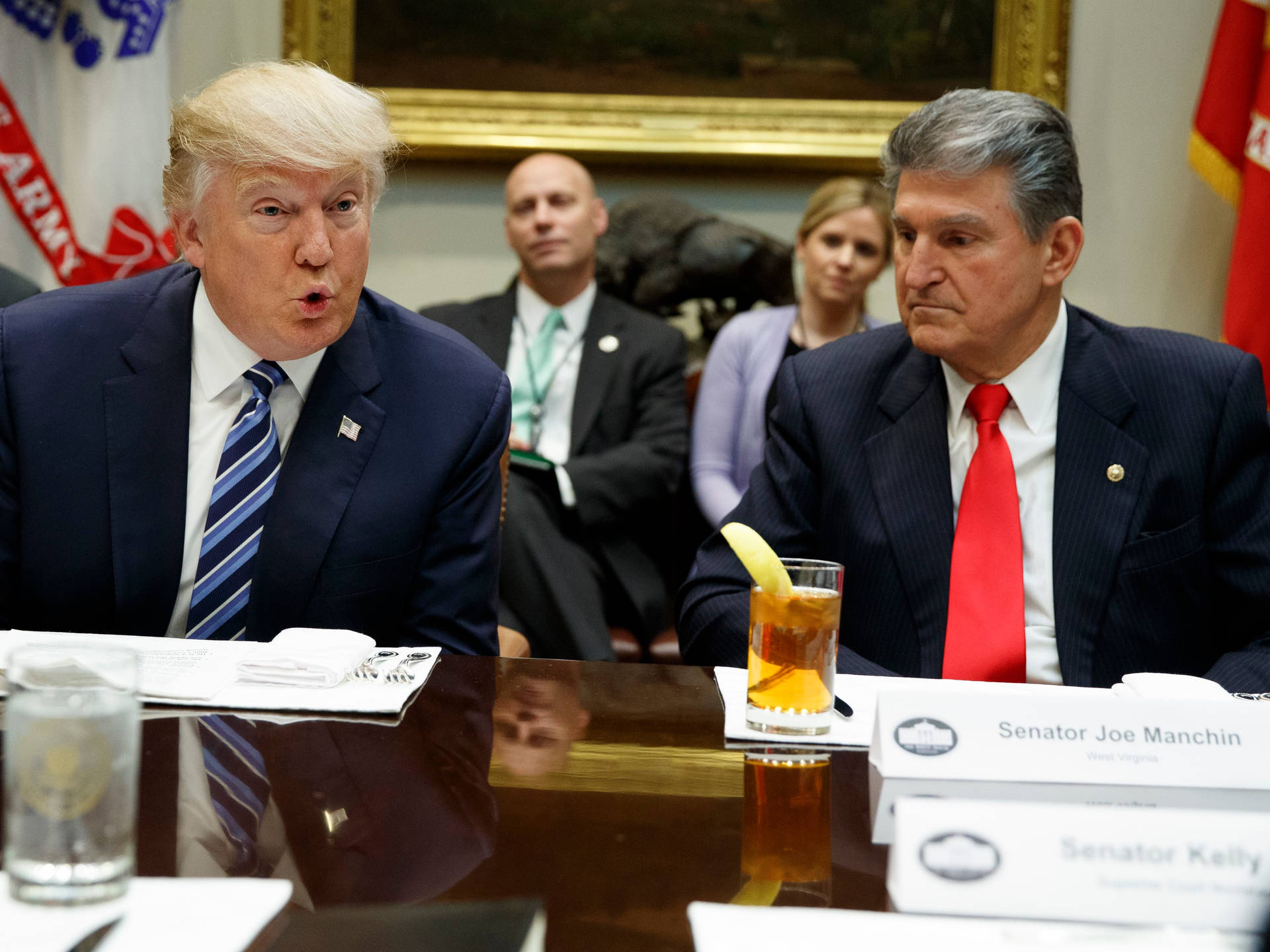 Senator Joe Manchin And President Trump Background