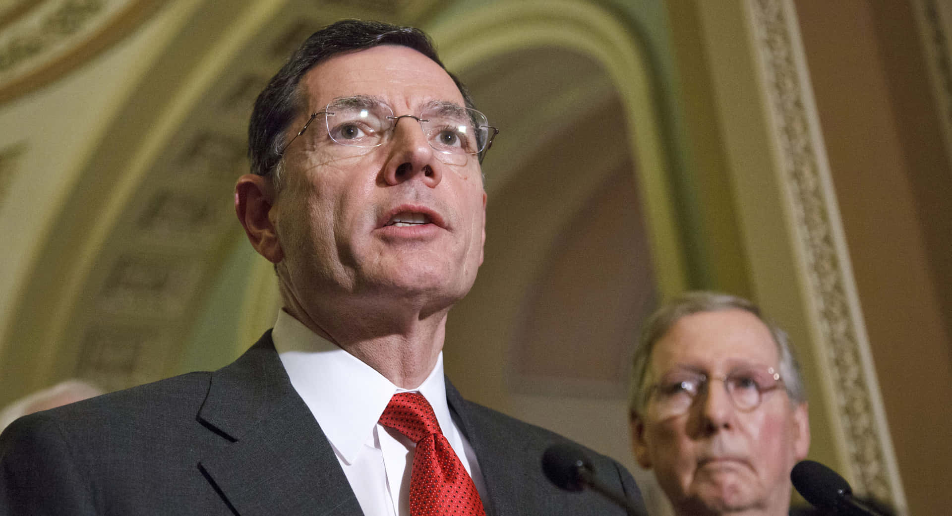 Senator John Barrasso And Senator Mitch Mcconnell In A Discussion During A Political Event Background