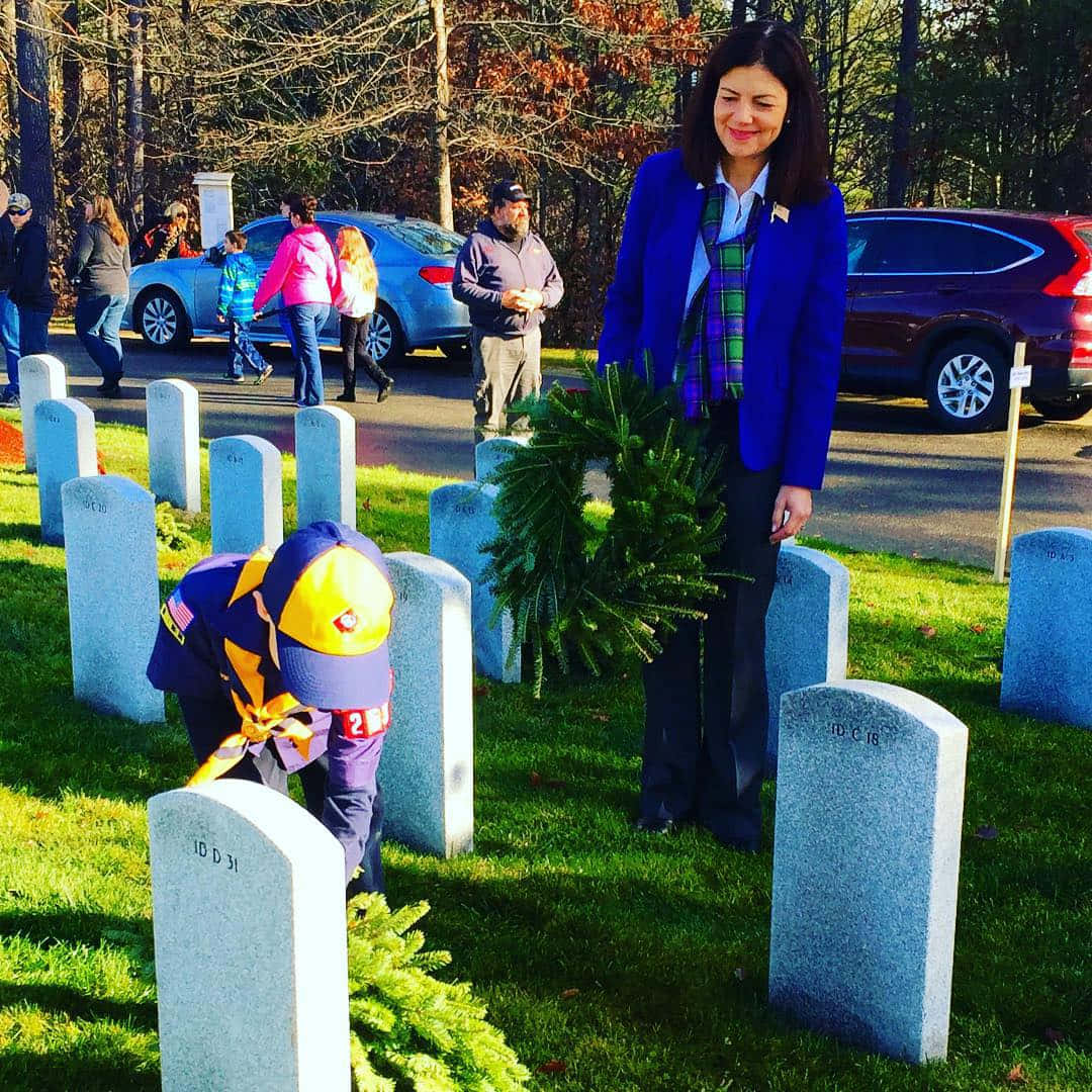 Senator Kelly Ayotte Visit A Veteran At His Grave. Background