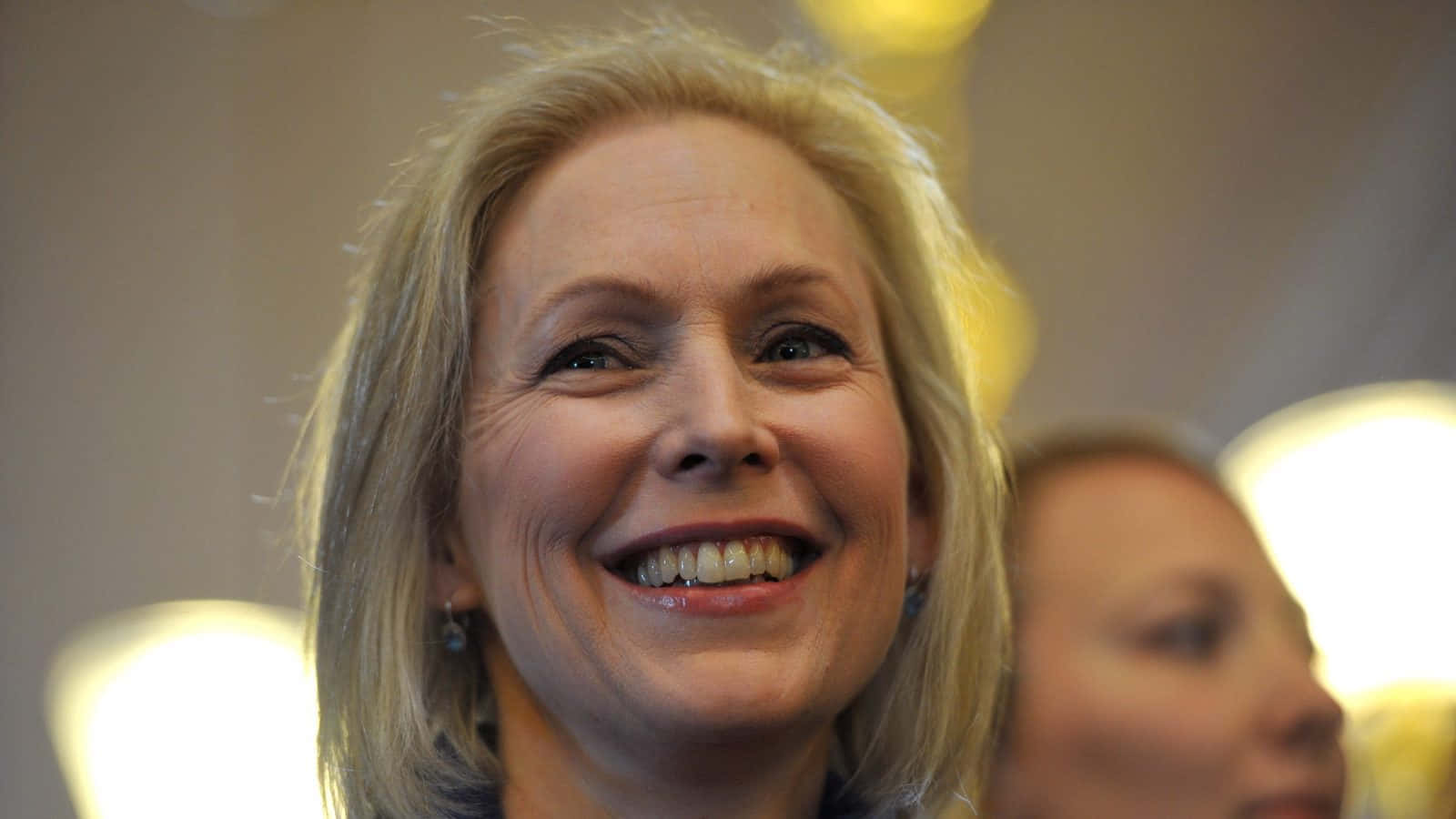 Senator Kirsten Gillibrand Smiling Background