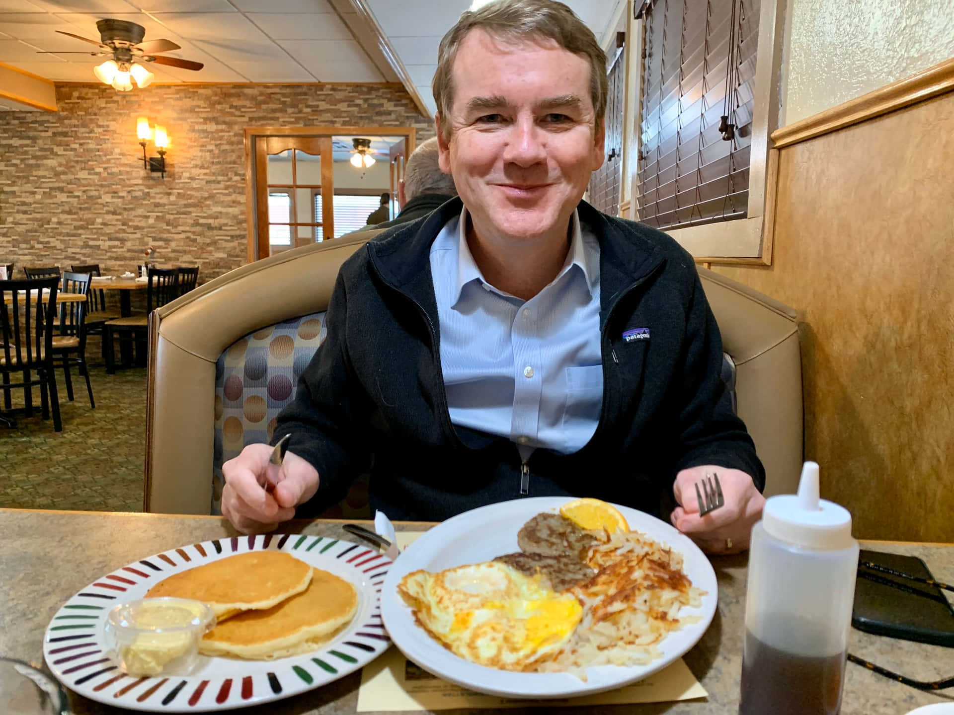 Senator Michael Bennet Enjoys A Healthy Breakfast. Background