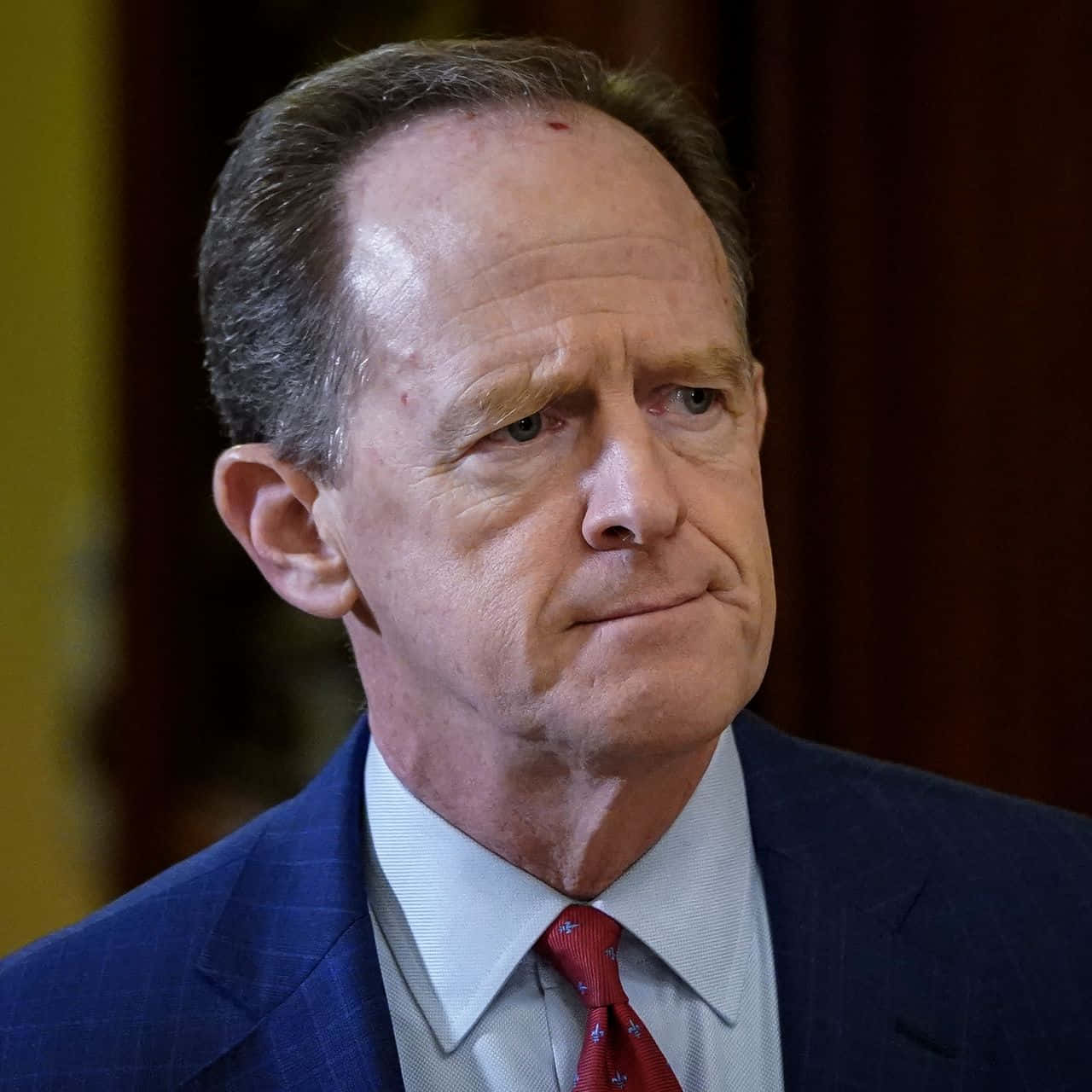 Senator Pat Toomey With A Serious Expression Background